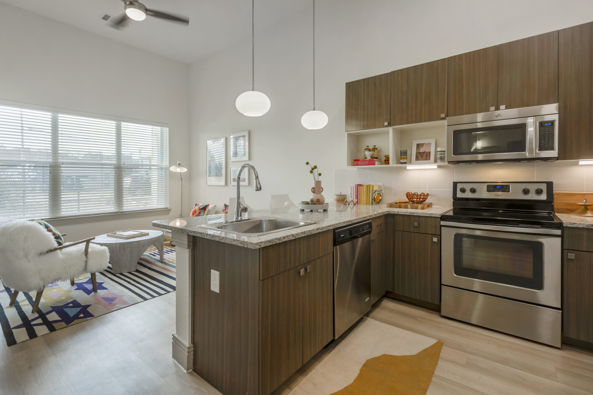 kitchen area with decor and view of living room